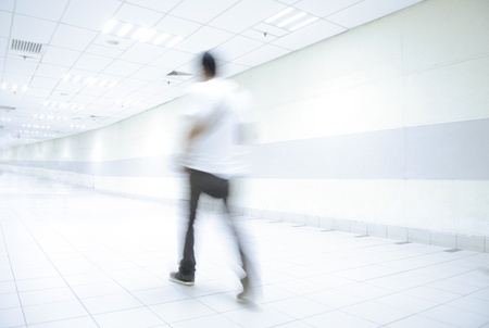 abstract of people walking motiong blue in high key ,focus on leg の写真素材