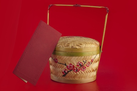 chinese new year basket with a back red cardの写真素材