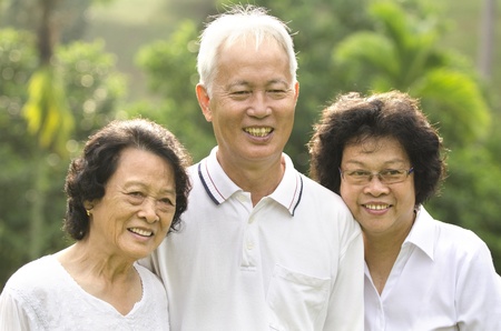 asian senior adult family with outdoor backgroundの写真素材