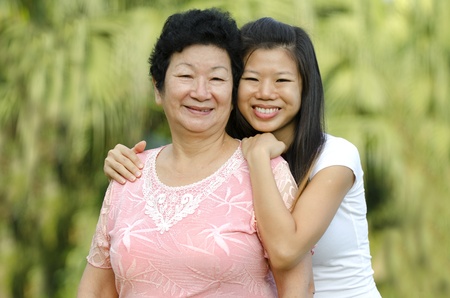 Portrait of asian mother and daugtherの写真素材