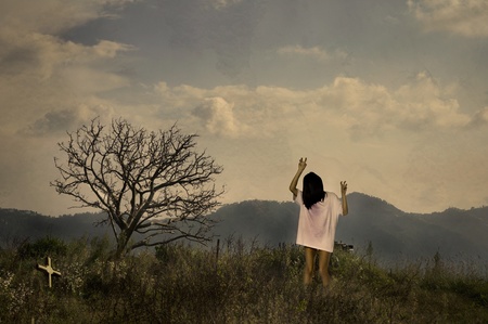 female ghost in the cemetry, grunge styleの写真素材