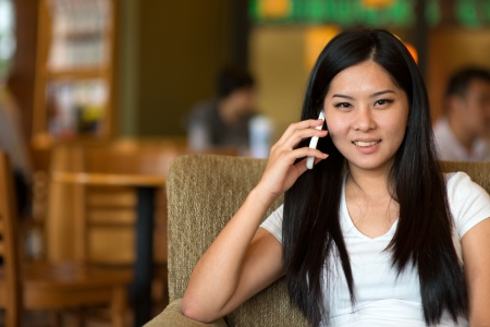 asian woman lifestyle  listening to phoneの写真素材