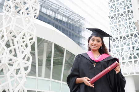 a young indian female graduate during her convocation day.の写真素材