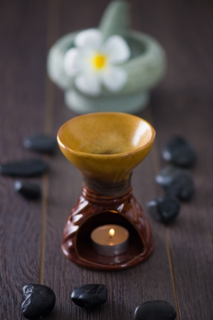 tropical frangipani spa health treatment with aroma therapy and hot stones, shot with ambient lights

の写真素材