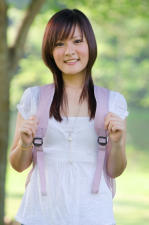 A portrait of a asian chinese race college student at campus

の写真素材