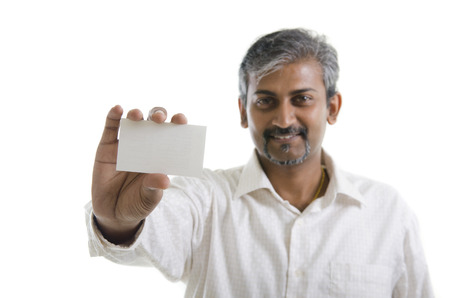 Indian businessman holding business cardの写真素材