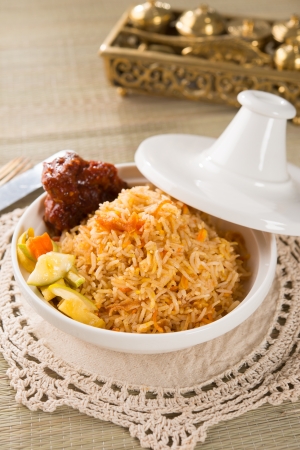 Biryani chicken rice cooked in arab style tajine with traditional india food

の写真素材