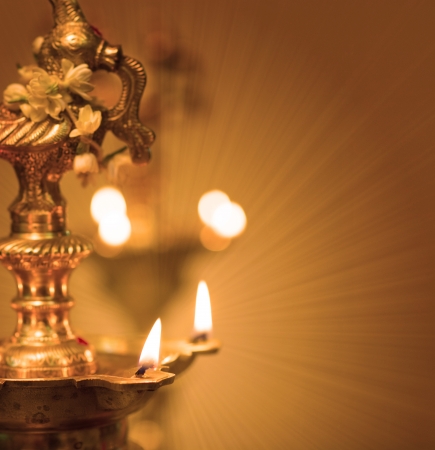 diwali indian oil lamp with traditional backgroundの写真素材