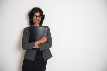 asian female businesss female holding a folder and filesの写真素材