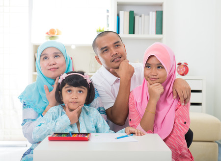 malay family learning together with lifestyle backgroundの写真素材
