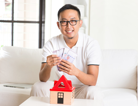asian casual male and house loanの写真素材