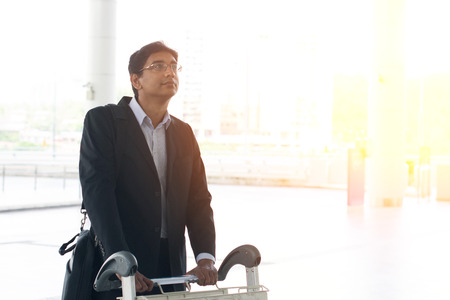 businessman at the airport with trolleyの写真素材