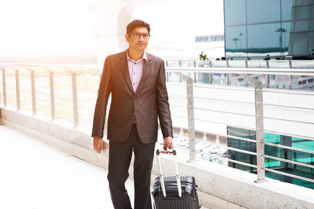 indian male walking at airportの写真素材