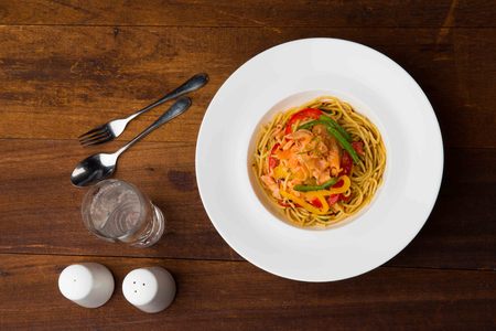 smoked salmon spaghetti flat lay viewの写真素材