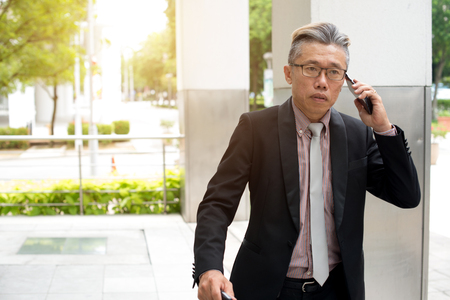 asian senior businessman travel with phone

の写真素材