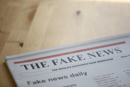 fake news paper on tableの写真素材