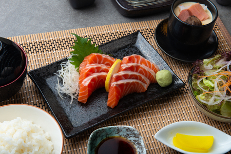 Raw salmon slice or salmon sashimi in Japanese style fresh serveの写真素材