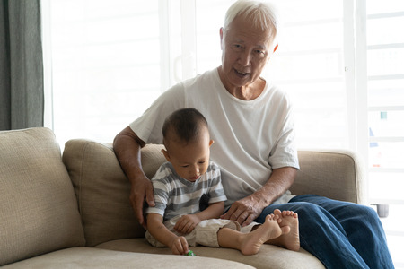 asian grandparent and grandsonの写真素材