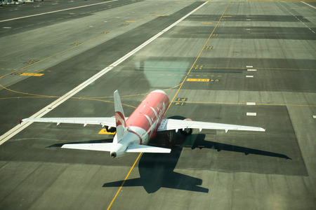 Chek Lap Kok, Hong Kong - April 4 2014 : Air Asia flight at Hong kong international Airportのeditorial素材