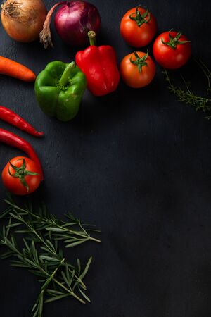 vegetables ingredients on dark rustic distressed background,の写真素材