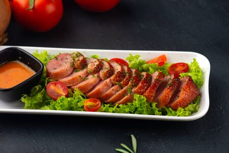 smoked duck with chilli sauce and saladの写真素材