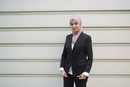 Young asian muslim business woman in head scarfの写真素材