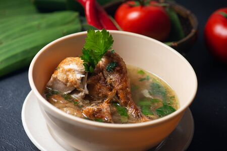 traditional style chicken soup with backgroundの写真素材