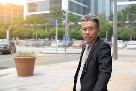 Portrait of smiling  businessman looking at cameraの写真素材