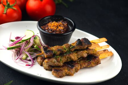 Malaysian chicken satay with delicious peanut sauce,の写真素材