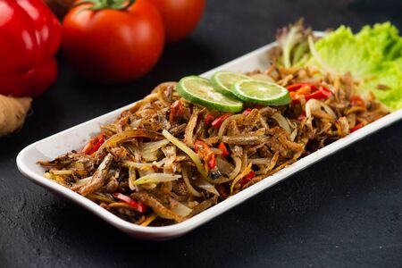 Stir-fried anchovy with sambal and chilli, traditional malay foodの写真素材