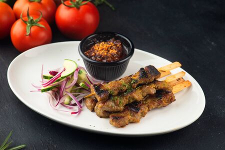 Malaysian chicken satay with delicious peanut sauce,の写真素材