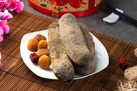 various chinese dried foods sea cucumber, scallop , mushrooms and red datesの写真素材