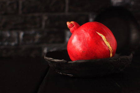 Gifts of Autumn. Juicy and useful pomegranate. の写真素材