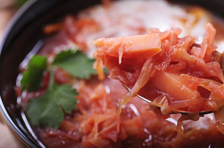 Delicious vegetable soup from cabbage and beet. Borscht.の写真素材