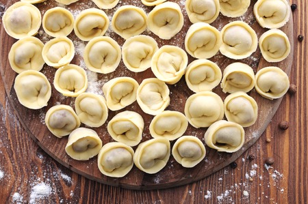Cooking homemade ravioli with meat. Delicious dinner, lunchの写真素材