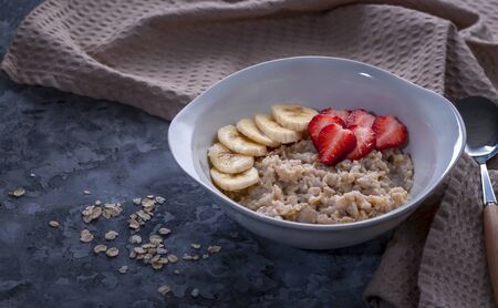 Oatmeal with fruits. Healthy food for breakfast. Dietary foodの写真素材