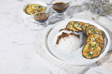 Delicious, fried eggplants with rice and soy sauce. vitamin food. Vegetarian dish.の写真素材