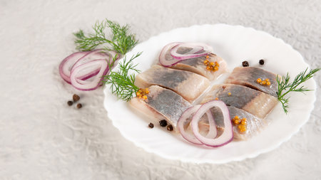 salted herring. seafood. Useful, delicious food. beautiful food presentation.の写真素材
