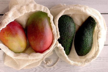 zero waste food shopping. eco natural bags with fruits , eco friendly. flat lay or top view....