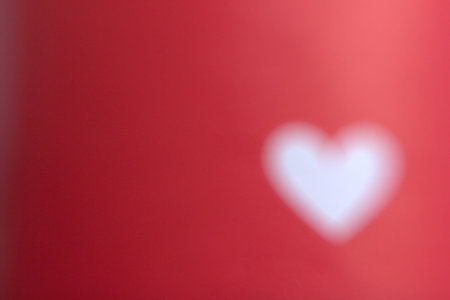 Beautiful red background with white heart, trend concept.の写真素材