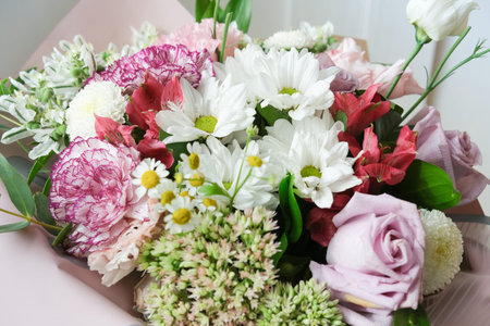 beautiful flower bouquet with roses, carnations and mixed flowers. anniversary selebration or...