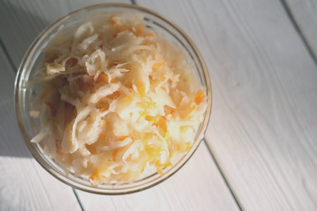 sauerkraut or white fermented cabbage. Canned vegetable food concept. probiotic food for good...
