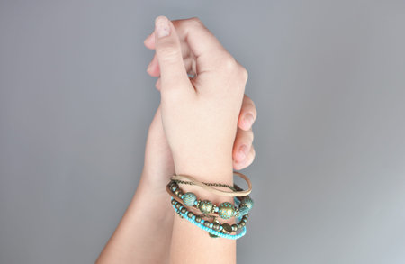 boho style bracelet made of leather and jems with metallic acsessories. blue and beige tones...