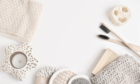 top view of sustainable bathroom accessories. copy space for text. face cleansers and washcloth made...