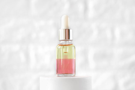 peptides nourishing oil in a glass bottle with dropper. two phase face oil enriched with anti age...