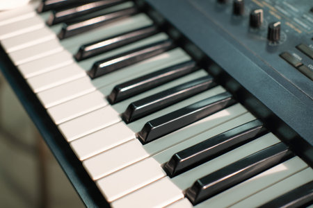 Electronic musical keyboard synthesizer close-up view. piano for recording music in a studio....