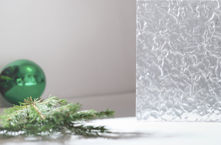 Winter Christmas scene with pine twigs for product presentation cosmetics. advertising display with...