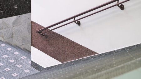 stairwell in a modern office building. railings on a wall