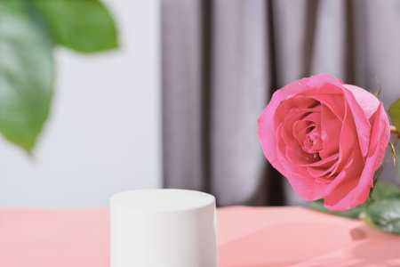 modern product display. geometric podium and pink rose flower. scene stage showcase for new product, promotion sale, banner, presentation, cosmetic solutionの写真素材