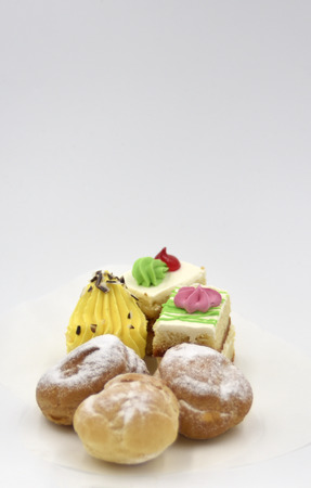 Isolated pastry with cream and sugar dustの写真素材